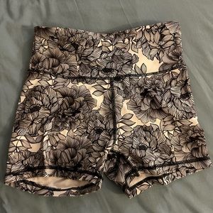 Black and white floral print biker shorts. Size small. 4 inch length
